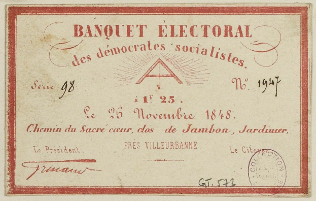 Alter Umschlag mit roter Grenze und einer Briefmarke, beschriftet mit "Banquet Electoral des Socialists".